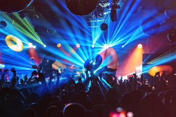 dj night club party rave with crowd in music festive - obrazy, fototapety, plakaty