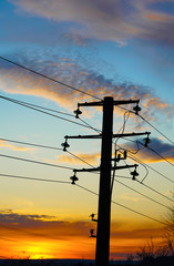   electric wires at sunset