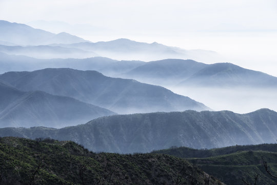 Fototapeta Layers of misty ridges in the San Gabriel Mountains in Los Angeles County, California