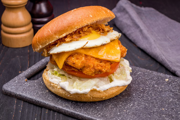 Burger with chicken and egg