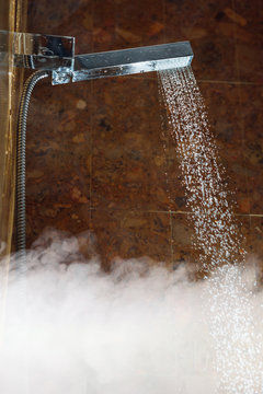 shower with water stream and hot steam