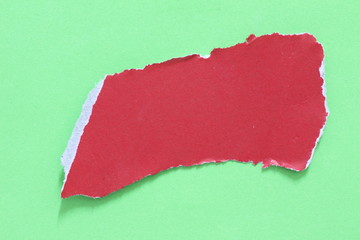 colored torn paper as a background. copy space