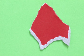 colored torn paper as a background. copy space