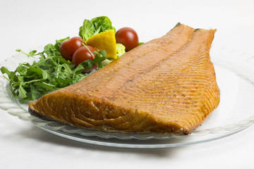 Smoked salmon fish fillet with vegetables. 
