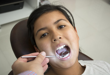 Child visits the dentist.