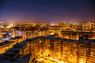 Aerial view at evening cityscape, Voronezh city downtown panorama, high-rise residential houses,  business buildings, urban after dawn