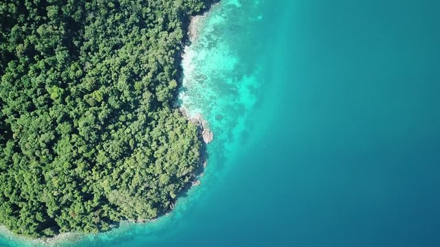 Aerial view from a drone of beautiful Nyaung Oo Phee island on sunny day in Myanmar
