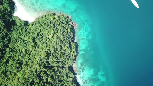 Aerial view from a drone of beautiful Nyaung Oo Phee island on sunny day in Myanmar
