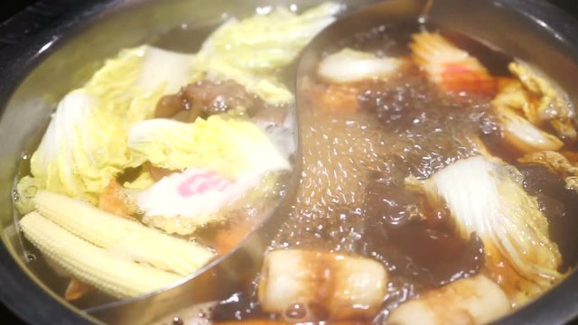 Shabu Shabu and Sukiyaki in hot pot at restaurant
