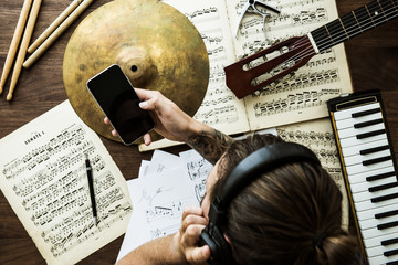 Man working with musical notes
