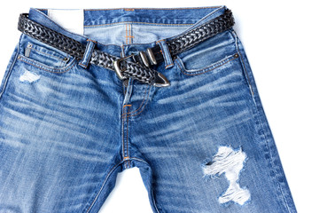 Fashion Rip denim jeans with belt background texture isolated