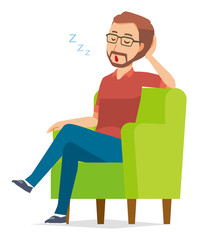 A bearded man wearing eyeglasses is sleeping on a sofa