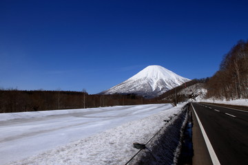 Landscape of Mt. Yotei seen from village of kimobetsu in Hokkaido in winter