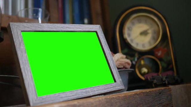 Green screen wooden rustic picture frame in living room 