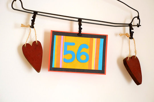 Number 56 anniversary celebration card against a bright white background