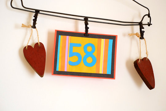 Number 58 anniversary celebration card against a bright white background