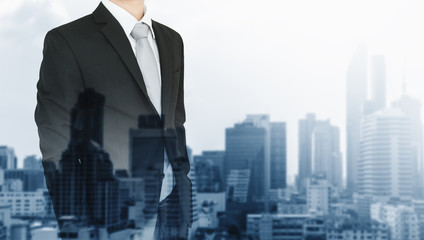 Double exposure, Businessman and city  background