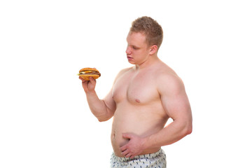 Fat man with hamburger isolated Junk meal leads to obesity. Disruption from diet concept. He is trying to go on a diet.
