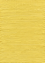 使い古しのTシャツをリメイクした黄色の布のテクスチャ 背景素材