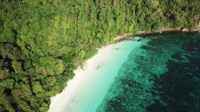 Aerial view from a drone of beautiful Nyaung Oo Phee island on sunny day in Myanmar

