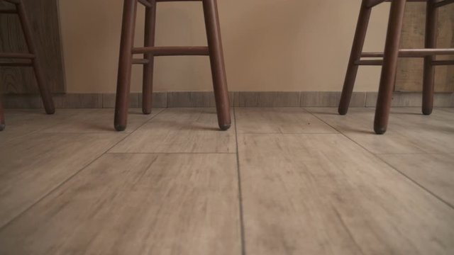 Wooden legs of bar stools