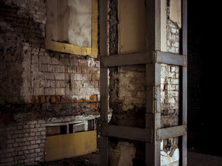 inside of the abandoned building with columns