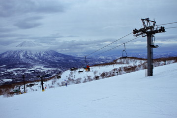 People who enjoy skiing at the Niseko Hirafu ski field in Hokkaido