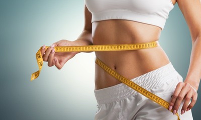 Woman with measure.