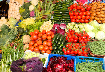 many fresh vegetables and fruits for sale