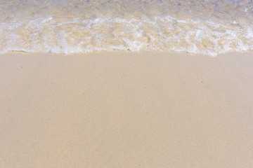 Fototapeta na wymiar surface of the sea and sand
