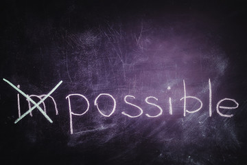 Chalkboard writing - concept of impossible or possible