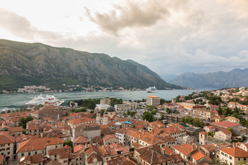 Fototapeta na wymiar View of old town roofs in a Bay of Kotor from Lovcen mountain in Montenegro.