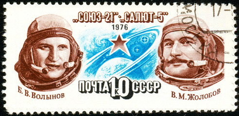 Ukraine - circa 2018: A postage stamp printed in Soviet Union show cosmonauts Volynov, Zholobov....