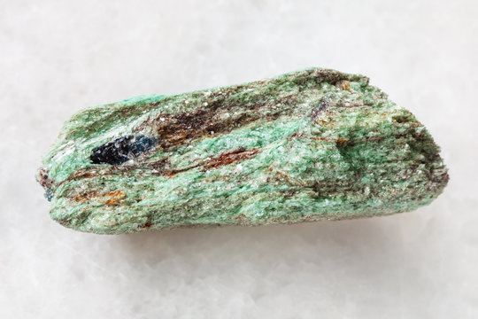 raw Paragonite stone on white