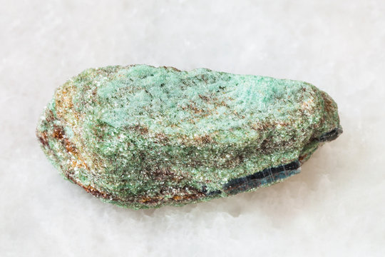 Paragonite stone on white