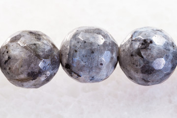 necklace from gray Labradorite gemstone on white