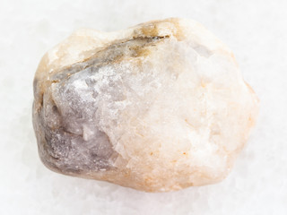 raw marble stone on white marble background