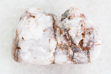 raw marble stone on white marble