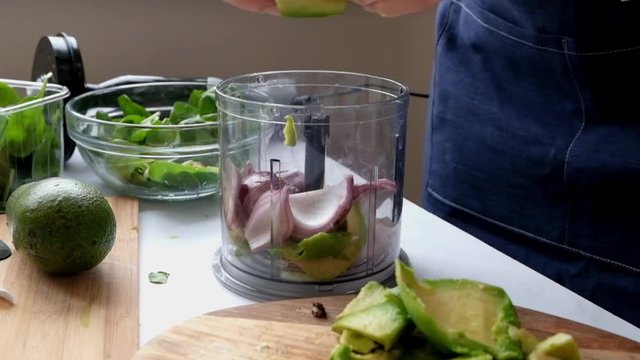 Woman Cooking Avocado Spread