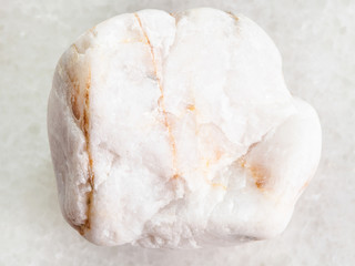 white marble gem on white marble background