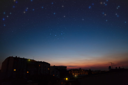 Starry Night Over The City At Night.