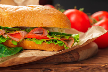 sandwich on a wooden table