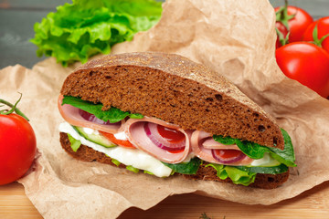 sandwich on a wooden table