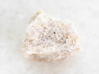 rough Conglomerate stone on white marble