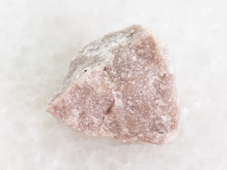 rough dolomite stone on white marble