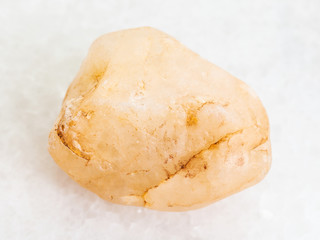 Calcite stone on white marble