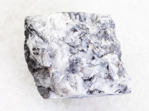raw magnesite stone on white marble