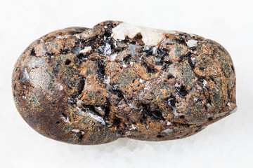tumbled sphalerite stone with Galena on white
