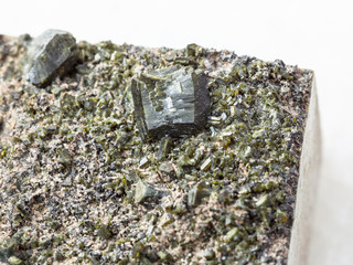 crystals of Epidote close up on white