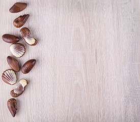 Chocolate candy desert. Chocolate candies in the form of seafood.